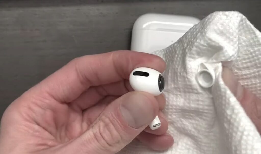 remove airpods pro tips using a paper towel