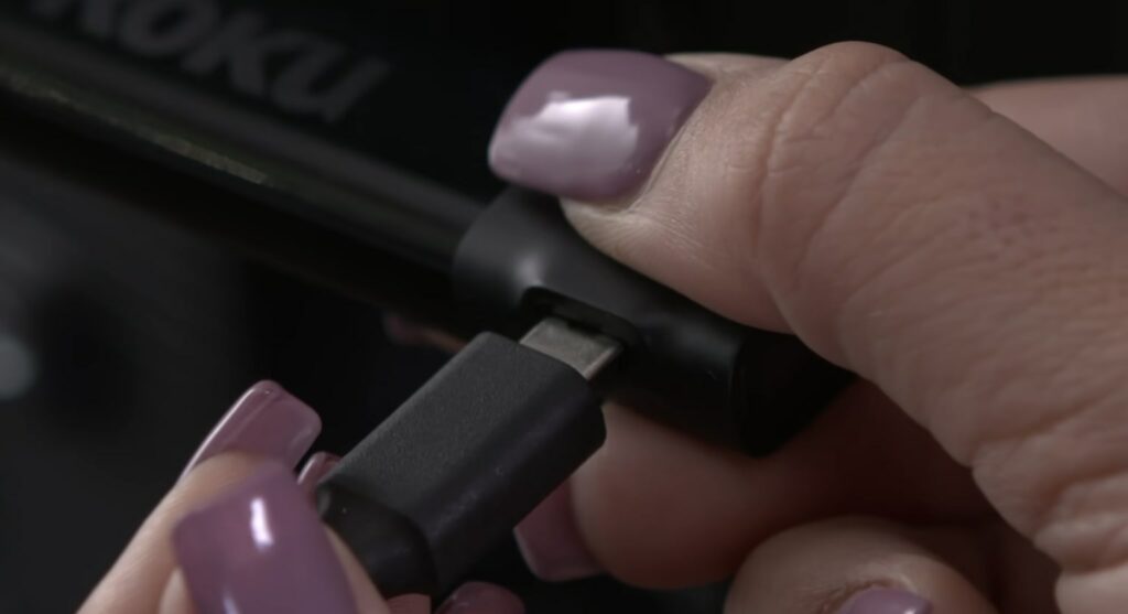 Connect the power cable to Roku.