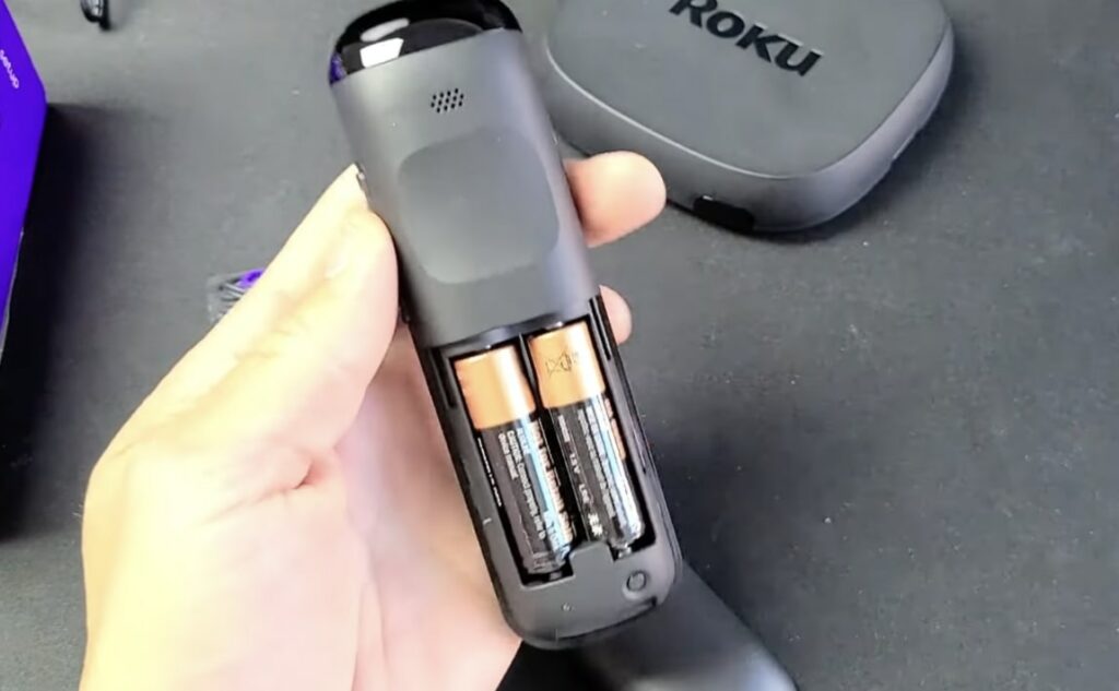 insert batteries on roku remote