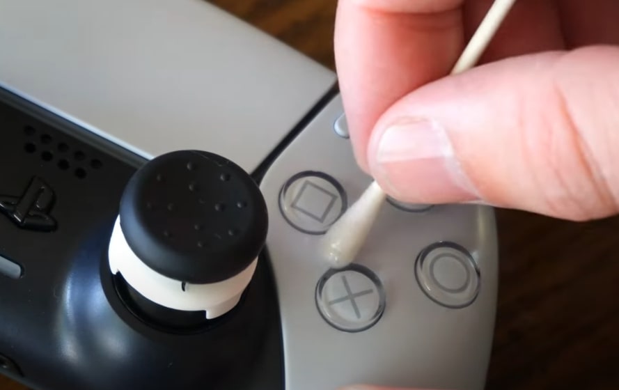 clean the ps5 controller buttons with q tip